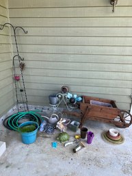 Decorative Wheel Barrel, Plant Stand, Rabbit Statue, Hoses, Shepherds Hooks, Garden Tools, Sprayer Heads,