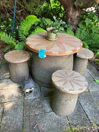 Pottery Garden Table And Four Stools. Small Potted Plant And Small Metal Lantern