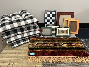 Four Chair Cushions, Area Rug,  Collection Of Picture Frames, Wall Art And Portable Chess Set