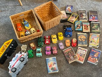 Rm5 Collection Of Chevron Car Toys, Ambulance And Trailer Toys, VHS Tapes, And Baskets