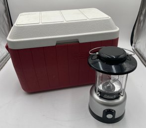 F1 Mid Sized And Lunch Size Coleman Coolers And Two Coleman Lamps