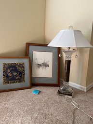 Two Framed Art Pieces And One Lamp