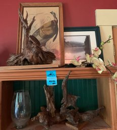 Assorted Artwork, Wood Sculptures On Stands, Glass Vase, Faux Flowers