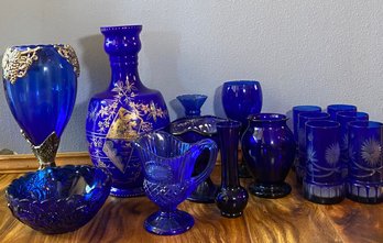 R5 Blue Glass Collection To Include A Large Goblet, A Larger Vase, Bowl Dishes, A Small Pitcher, Smaller Vases