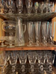 Assorted Glassware, Glass Pitcher, Cake Plates, Champagne Glasses