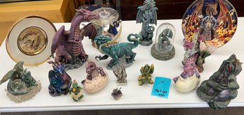 Collection Of Dragon Figurines And Plates