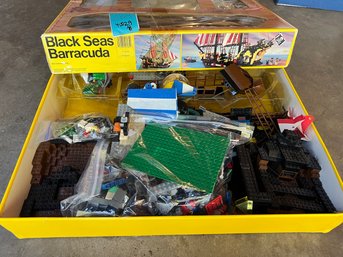 R0 Legos In A Black Seas Barracuda Box. Unknown If The Set Is Complete.