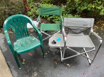 R00 Folding Camp Chairs With Sidetables And One Green Plastic Chair