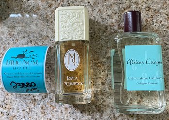 Rm10 Two Mostly Full Bottles Of Perfume. One Is Jessica McClintock And The Other Is Atelier Cologne