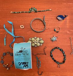 Rm13 Collection Of Blue Jewelry Including Bracelets, Necklaces, A Ring, A Pin, And Other Jewelry