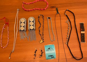 Rm13 Collection If Black And Red Jewelry Including Necklaces, Earrings, And Pins