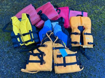 R0 Life Vests Of Various Sizes And Flotation Cushions
