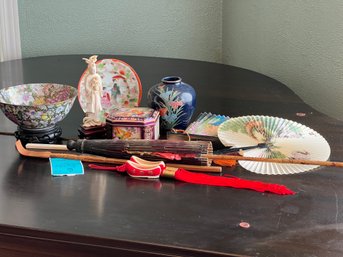 R1 Collection Of Asian Style Decorative Pieces.  Fans , Umbrella, Bowl With Stand, Figurine, Vase, Plate, Tin