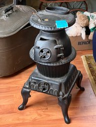 R1 Antique Looking Cast Iron Wood Or Coal Burning Stove 25.5in Tall. Base Is 13in X 14in At Feet Heavy Item