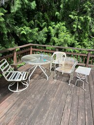 Outdoor Glass Topped Round Patio Table With 3 Different Chairs And One Side Table