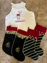R0 Mixed Christmas Lot Of Velvet Stockings, New Apron, Candles, Icicle Garland, German Linen Runner 56in X 18.