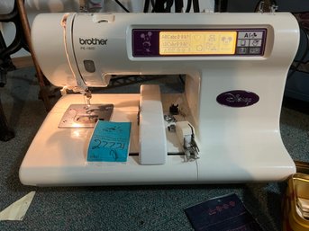 R9 Brother PE 180D Disney Sewing Machine.  Includes  Wheeled Travel Tote.  Turned On At Time Of Lotting