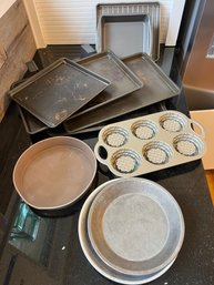 R8 Cabinet Of Cook And Bakeware.  Cookie Sheets, Shortcake Pan, Bundt Pans, Pyres Bowls, Pyrex Baking Dishes,