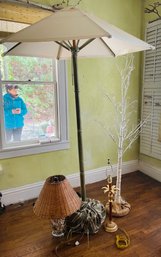 R5 Canvas Umbrella, Two Lamps, One Without A Shade, A Light Up Tree