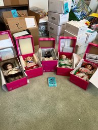 Boxed Collectibles: Marie Osmond Porcelain Dolls.  Set Of 5 Around The World