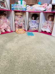 Boxed Collectibles: Marie Osmond Small Porcelain Dolls Set Of 4
