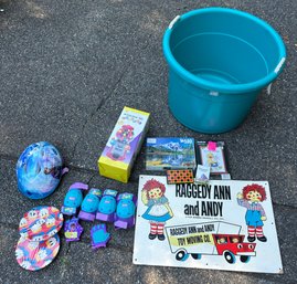 R0 Kids Lot To Include Doc Mcstuffins Knee Pads And Gloves, Gumball Machine, Frozen Helmet, Toy Bucket, And Mo