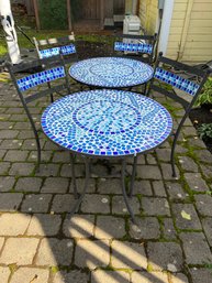 R0  Two Mosaic Tile Topped Outdoor Tables With Four Chairs. Metal And Tile