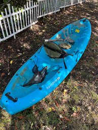R0 Kayak Spitfire 9 Sit Atop Kayak With Half A Paddle.  Has Ben Stored Outside Under Trees