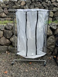 R00 Wheeled Folding Adjustable Height Clothing Rack With Plastic Zippered Storage Bag