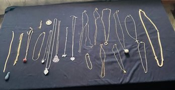 R7 Variety Of Costume Jewelry In Gold And Silver Tones With A Bracelet And Some Pendants