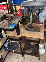 Rm0 Two Work Benches With Underneath Storage, Craftsman 8-inch Drill Press, And Bag Of Wood