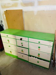 R0 Green And White Dresser In Garage Filled With Tools And Handyman Notions