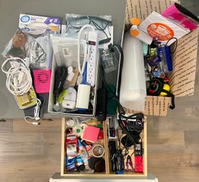 R5 Miscellaneous Drawer Lot To Include Power Strips, Tape, Glue, Scissors, And Other Miscellaneous Items