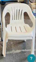 RM0 Two Plastic Chairs