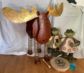 R6 Metal Moose Standing Art, Two Wood Frog Art Pieces And Hand Drum From Guinness