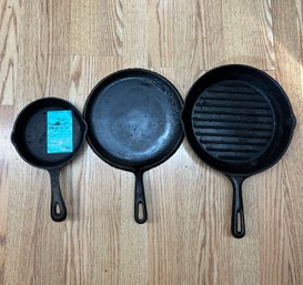 R2 Cast Iron Cookware Including Frying Pan, Mini Skillet, And Flat Pan