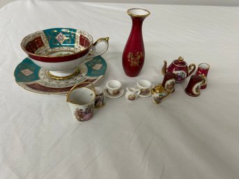 BNH Two Miniature French Tea Sets, One White, One Maroon , Small Maroon Vase, Tea Cup With Matching Plate All