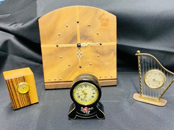 Four Small Clocks