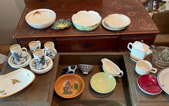 Variety Of Mismatched  Dishware Including A Lettuce Bowl, Blue And Yellow Norwegian Cups And Saucers