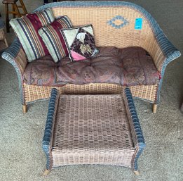 R1  Palecek Wicker Settee, Covered Cushion, Three Accent Pillows, And Wicker Footstool