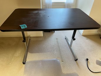 R5 Adjustable Height Desk. 48in X 30in Top  Located Upstairs