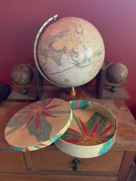 Globe, Mini Globe Bookends, And A Decorative Box