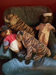 Two Stuffed Bears And Two Stuffed Tigers