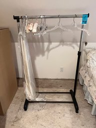 R12 Garment Rack Adjustable Height 52in As Shown. 35in Wide