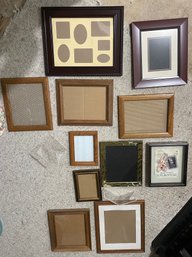 Collection Of Picture Frames And A Shadowbox