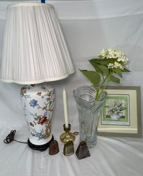 Floral Asian Inspired Lamp, Vase With Faux Flower, Three Vintage Cowbells, A Candlestick Holder With Candle