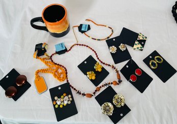 Desert Scape Mug And Collection Of Costume Jewelry To Include Necklaces And Clip On Earrings