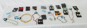 Collection Of Costume Jewelry To Include Necklaces, Clip On Earrings, Crystals, A Ring