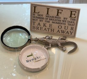 R6 Decorative Lot To Include Alligator Magnifying Glass, Ash Tray, Paris Mug And Small Plaque