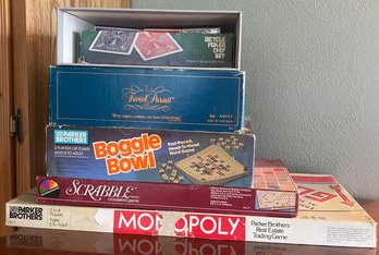 RM1 Lot Of Boardgames To Include Monopoly, Pictionary, Trivial Pursuit, Boggle Bowl, Card And Poker Set